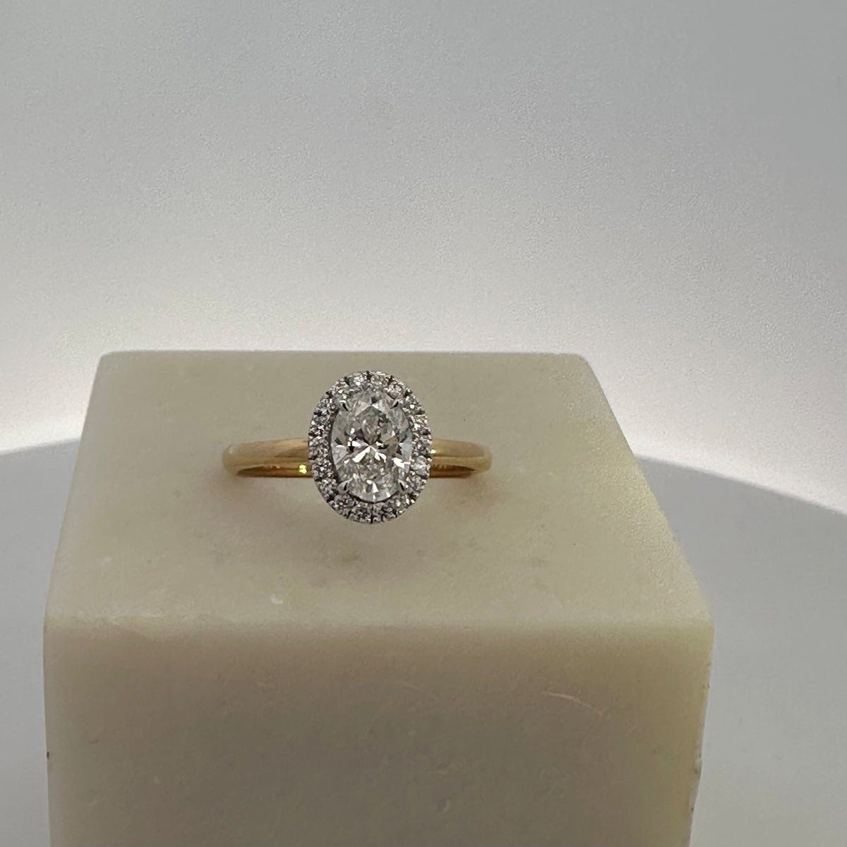 1ct Oval Cut Lab Grown Diamond Halo Ring in 18ct Yellow and White Gold