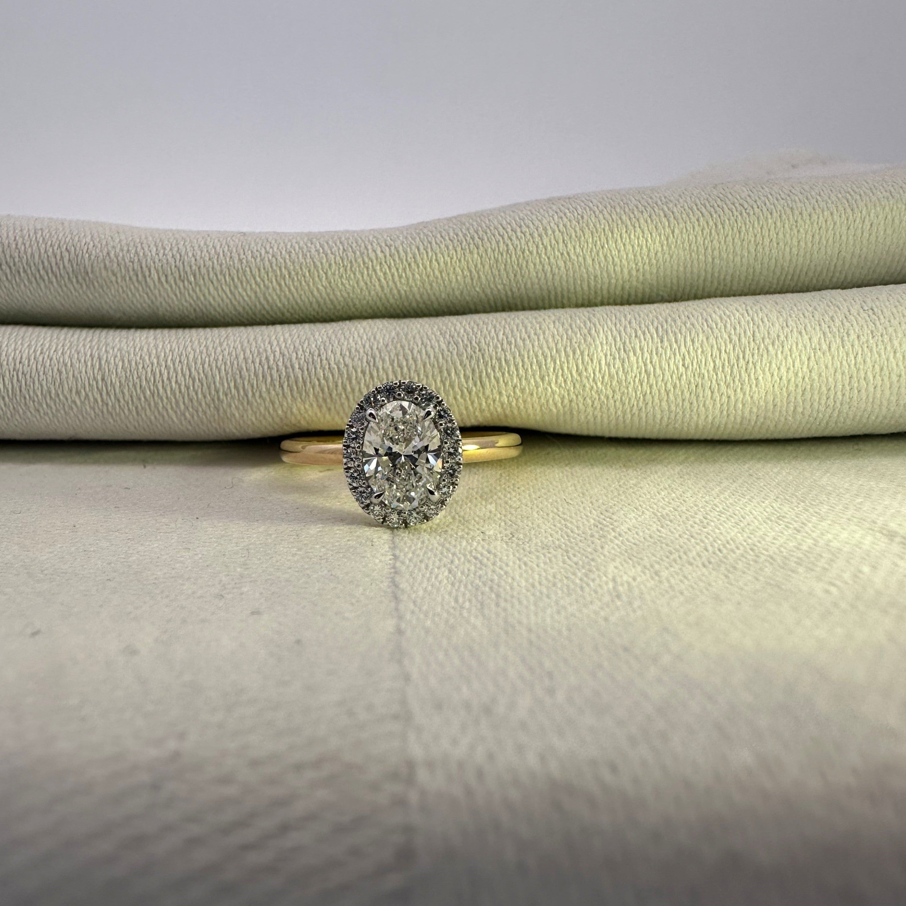 1ct Oval Cut Lab Grown Diamond Halo Ring in 18ct Yellow and White Gold