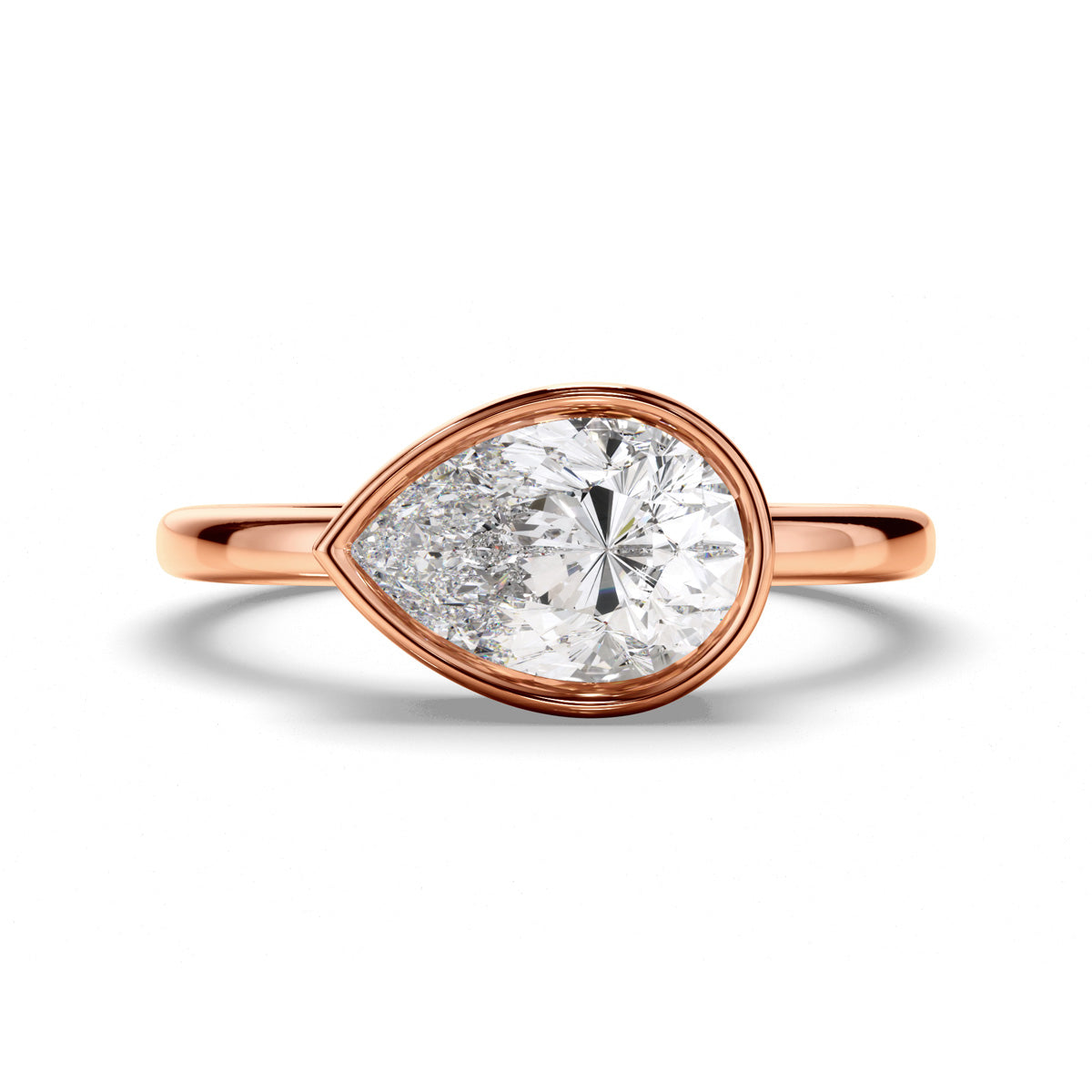 Pear Cut Diamond Bezel East West Solitaire Engagement Ring